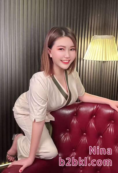 Nina, elegant high-end elite companion KL offering luxury dates in Kuala Lumpur.
